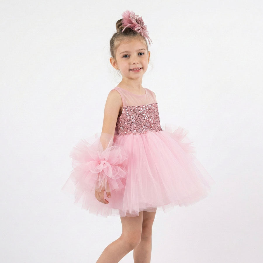 Pembe, mor ve beyaz renk seçenekli, kolları tülden ponpon detaylı payetli kız çocuk abiye elbise