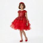 Belinde saten fiyonk detaylı, kabarık tül etekli kız çocuk abiye.