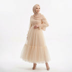 Ten rengi dik yakalı uzun kollu büzgü detaylı kadın tül abiye elbise